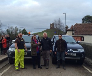 From left: Stuart Smith volunteer driver, Heather Venn Chair of FLAG, Cllr David Fothergill and Tim Holmes volunteer driver with the Mitsubishi L200s at Burrowbridge, Somerset