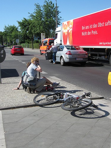 Traffic Accident involving a truck, some cars and cyclists