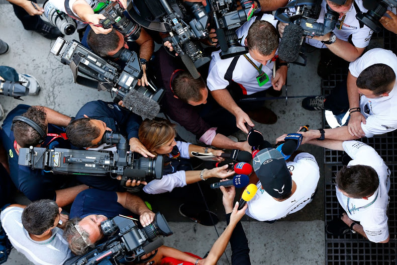 Lewis Hamilton faces the media in Brazil.