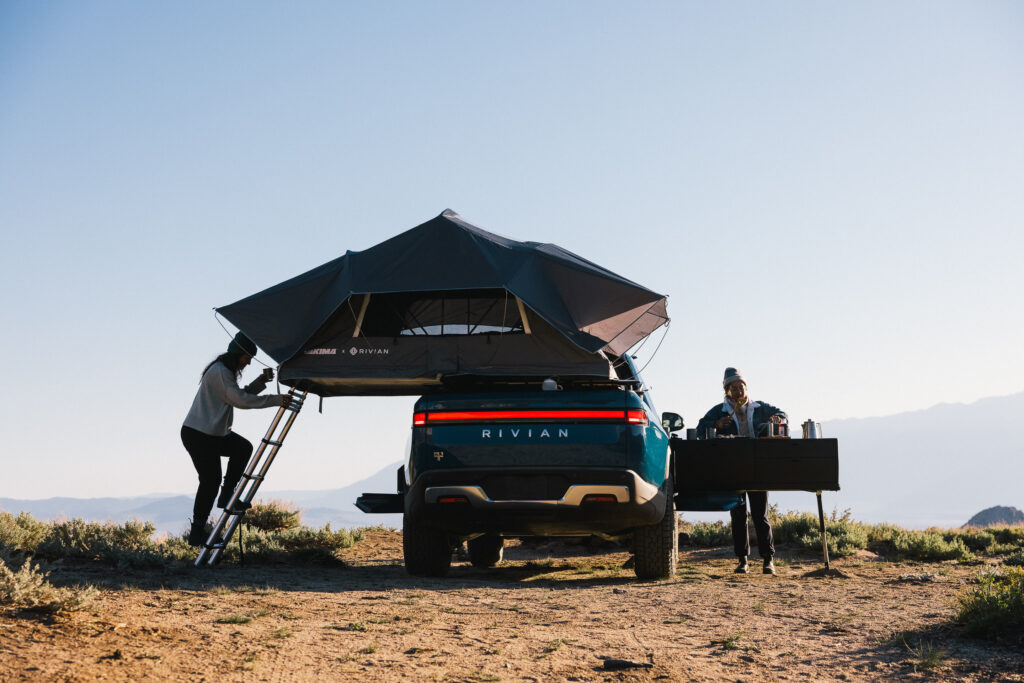 Rivian R1T setting up camp in the desert.