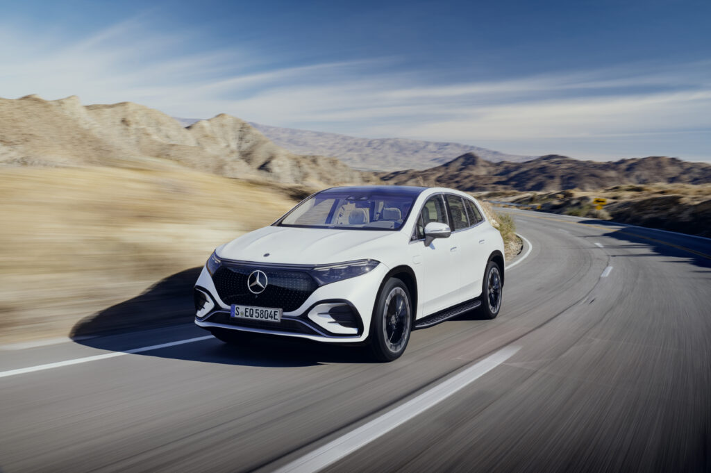 The new Mercedes-Benz EQS SUV driving through the desert