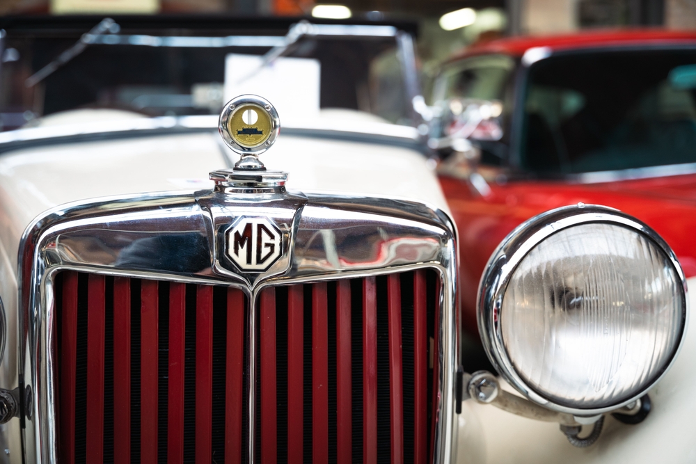 Traditional MG (Morris Garages) car and badge. Return to the UK?