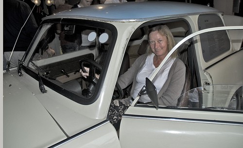 woman sitting in white car