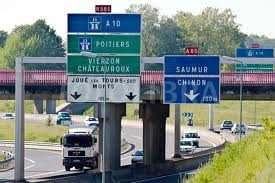France- Picture of French winding country road passing through a vinyard