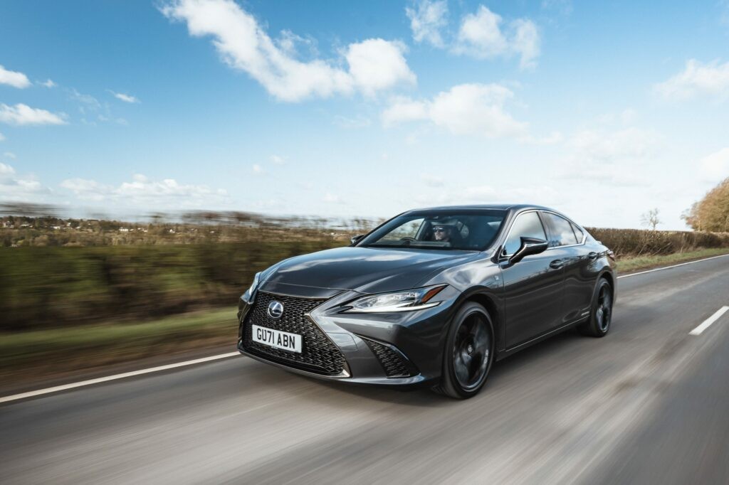 Leasing a Lexus: Drive Luxury in the UK- Lexus saloon on country road